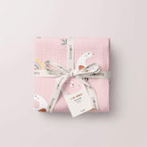 Lady Goose swaddle folded and tied with twine for gifting